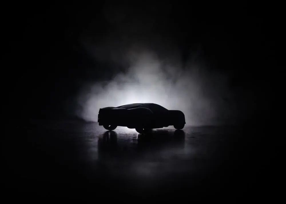 Sports car silhouette at an event