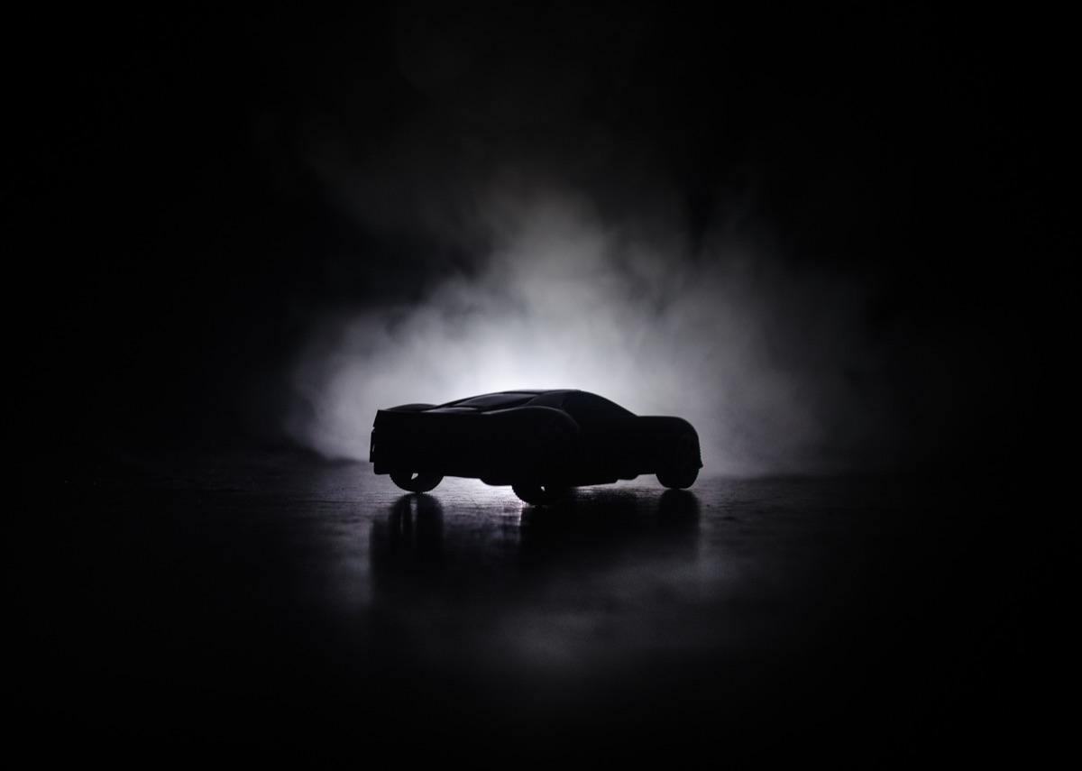 Sports car silhouette at an event