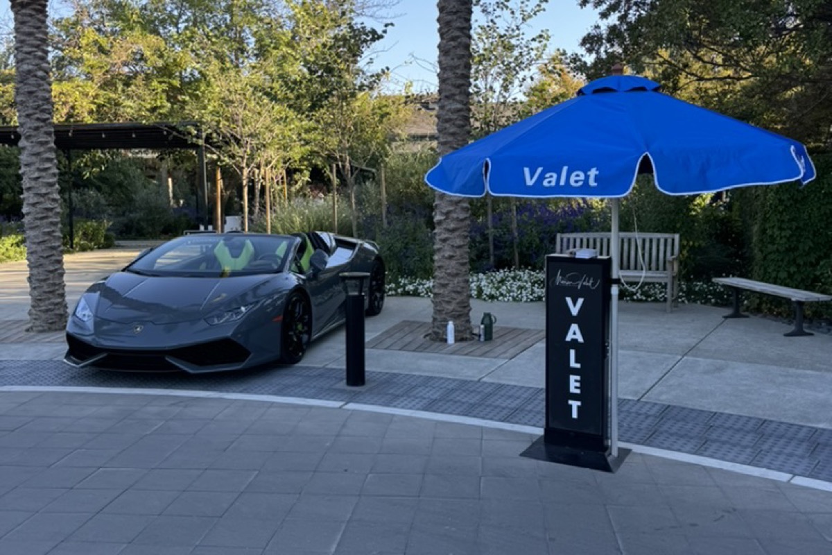 Luxury vehicle valeted beside a Marin Valet stand